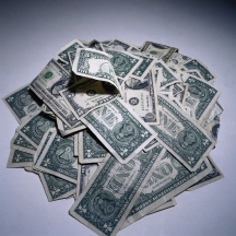 Image of a pile of dollar bills. How much does it cost? I'll buy it!